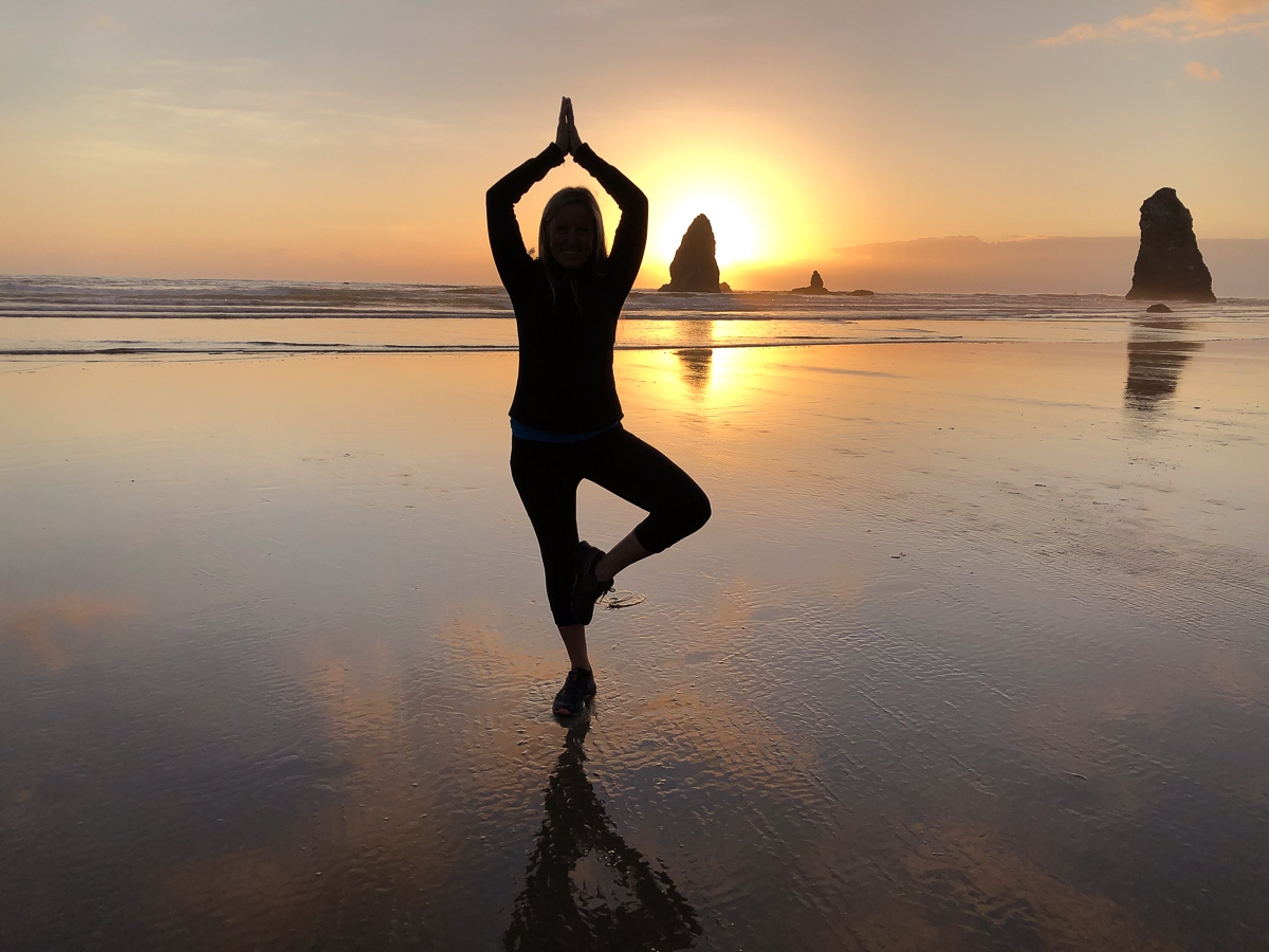 A woman in a peaceful yoga pose, representing balance and philosophy